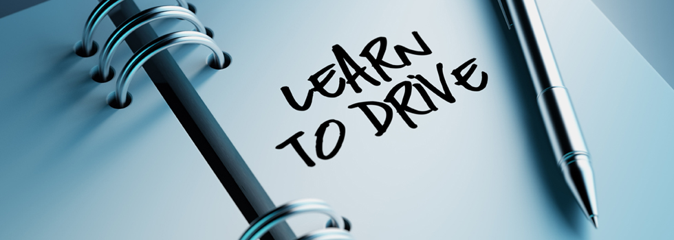 learn to drive written on notebook